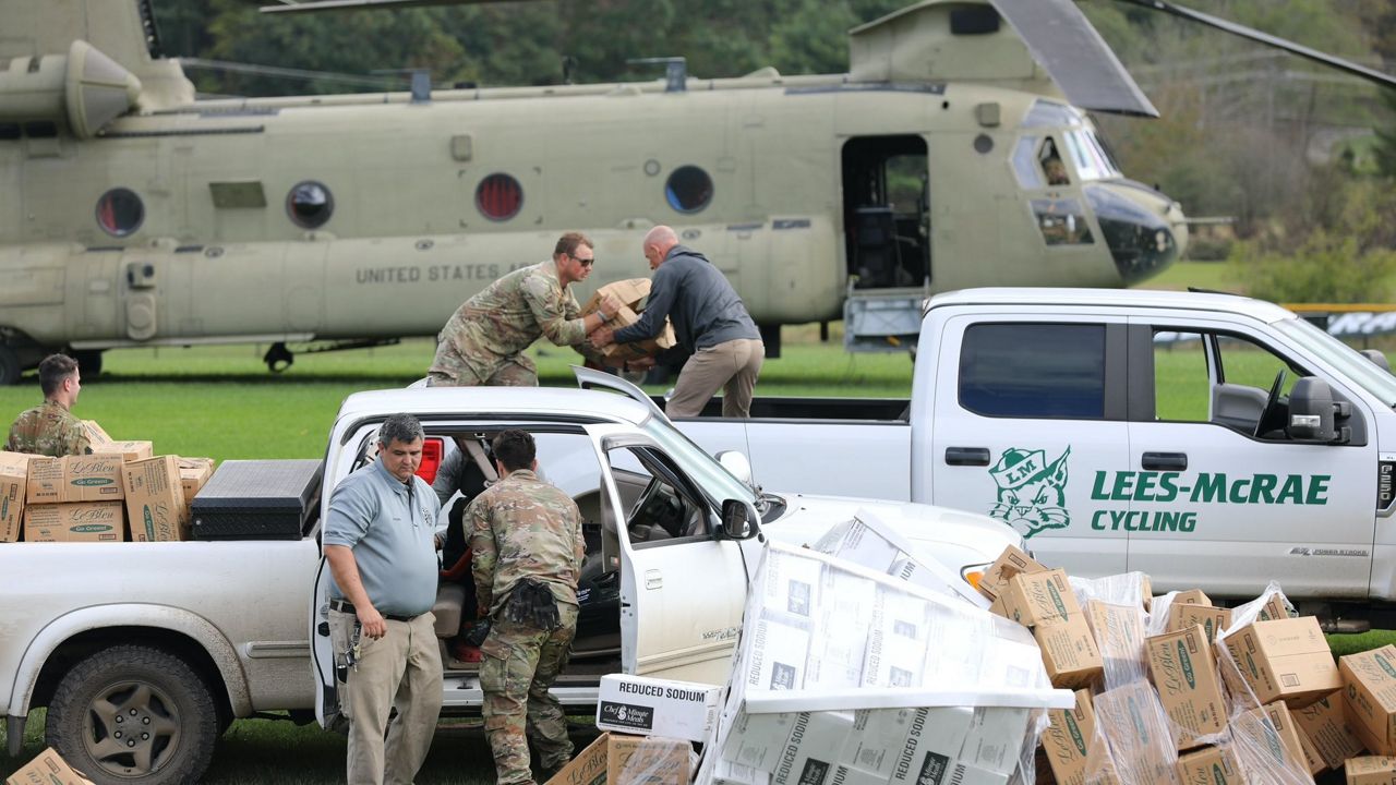 Aviation crews from across the country work to distribute food after landing in western North Carolina. (National Guard via X)