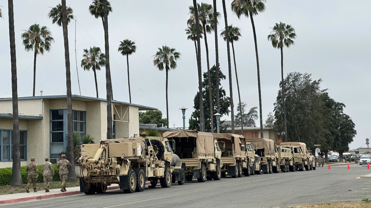 National Guard soldiers stage during deployment for duty for the Los Angeles protests on Wednesday at the Joint Forces Training Base in Los Alamitos, Calif. (AP Photo/Eugene Garcia)