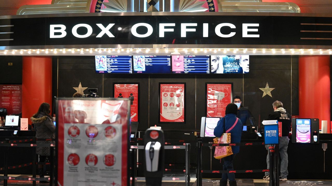 FILE - Movie theaters reopen after COVID-19 closures on March 5, 2021, in New York. For one day, Sept. 3, 2022, movie tickets will be just $3 in the vast majority of American theaters as part of a newly launched “National Cinema Day” to lure moviegoers during a quiet spell at the box office. (Photo by Evan Agostini/Invision/AP, File)