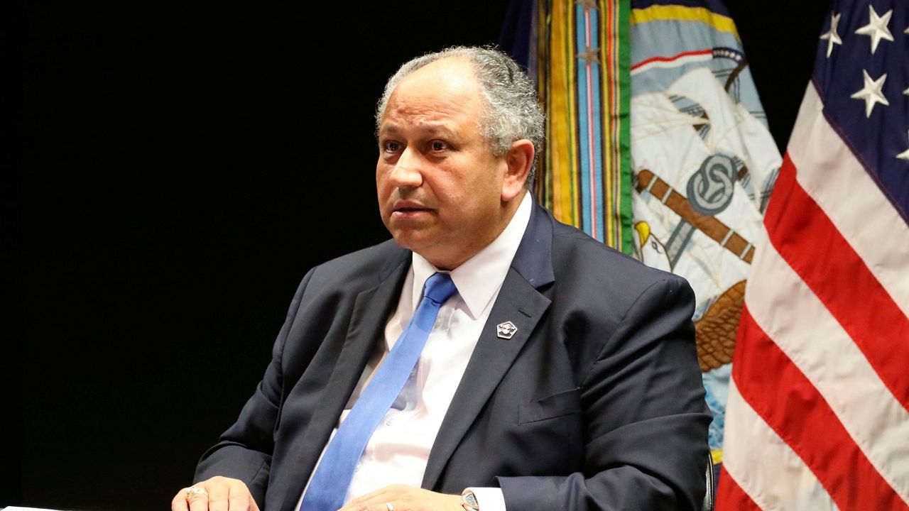 Navy Secretary Carlos Del Toro speaks at a news conference at Joint Base Pearl Harbor-Hickam on Dec. 6, 2021. (AP Photo/Audrey McAvoy) 