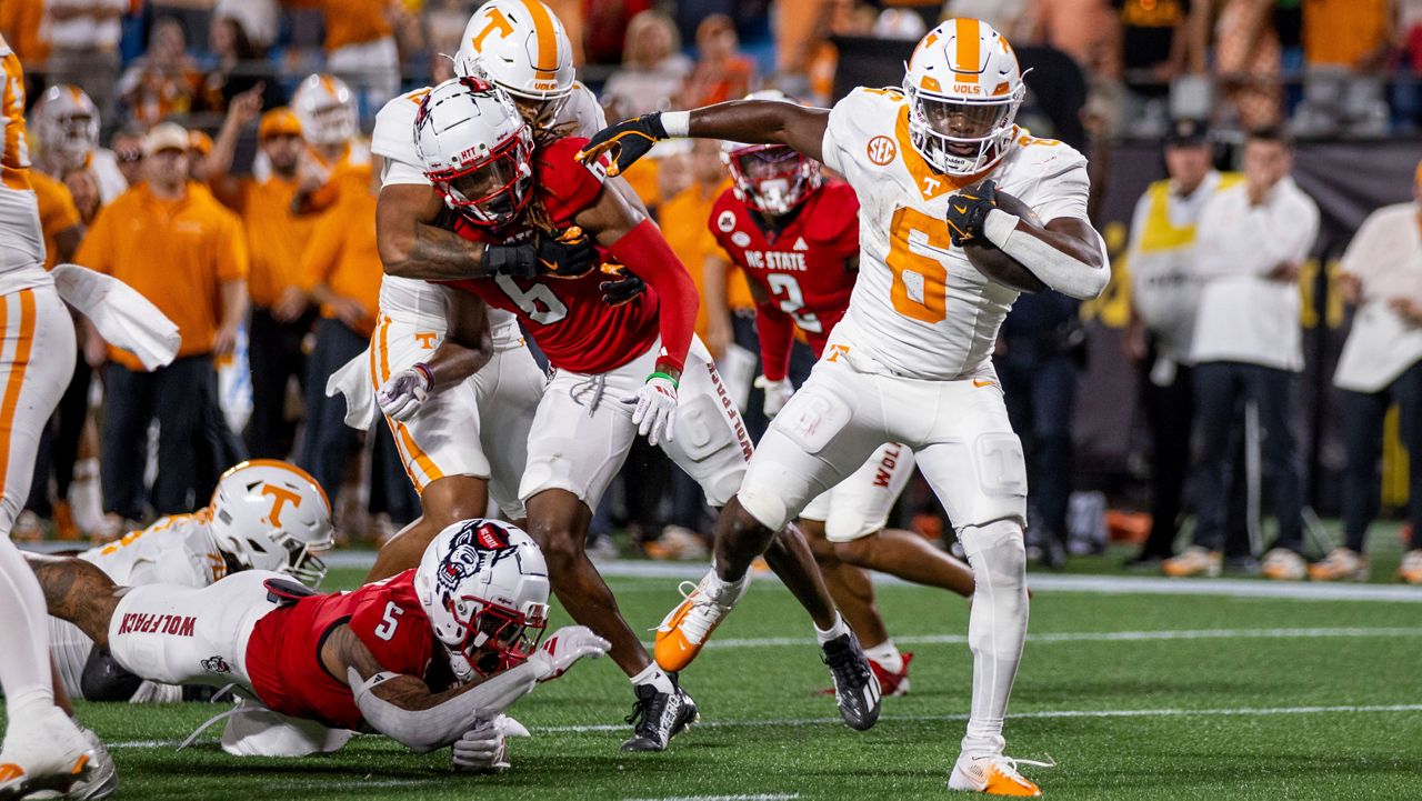 Tennessee running back Dylan Sampson (6) breaks for a touchdown against N.C. State during the first half of an NCAA college football game Saturday, Sept. 7, 2024, in Charlotte, N.C. (AP Photo/Scott Kinser)