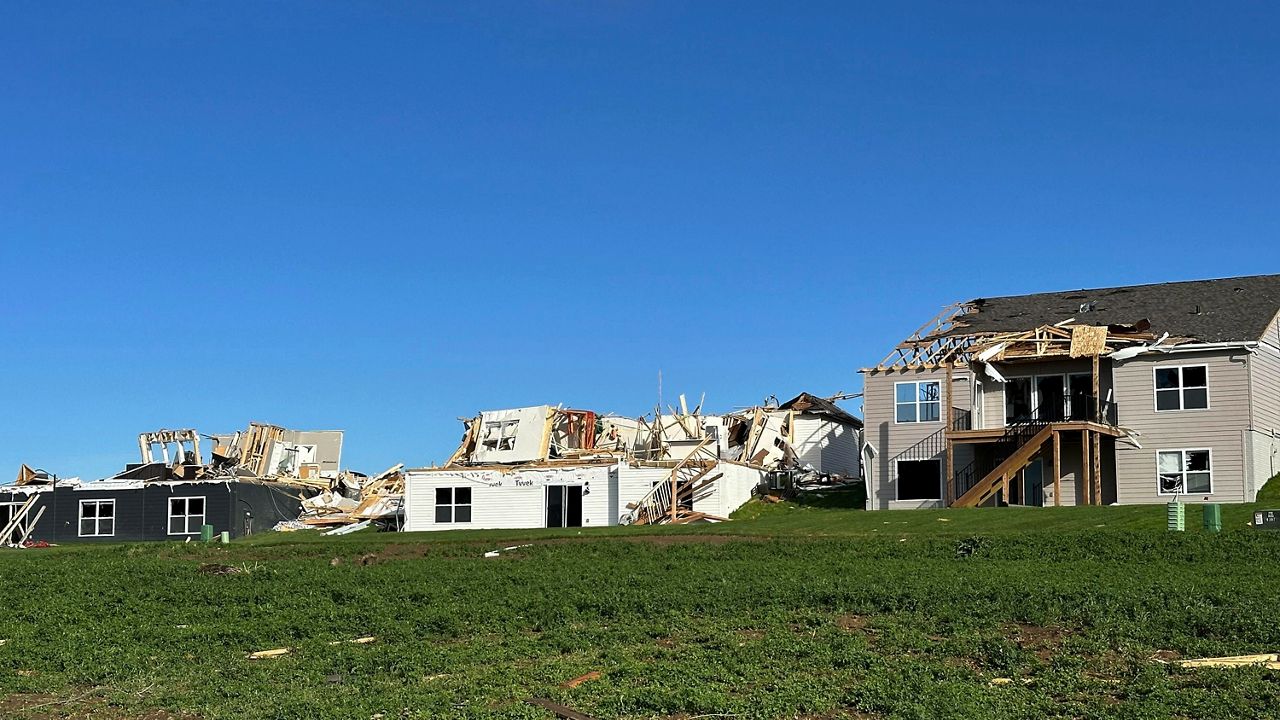 Debris surround destroyed and damaged homes in Elkhorn, Neb., on Saturday, April 27, 2024. Residents began sifting through the rubble after a tornado plowed through suburban Omaha, demolishing homes and businesses as it moved for miles through farmland and into subdivisions. (AP Photo/Nick Ingram)