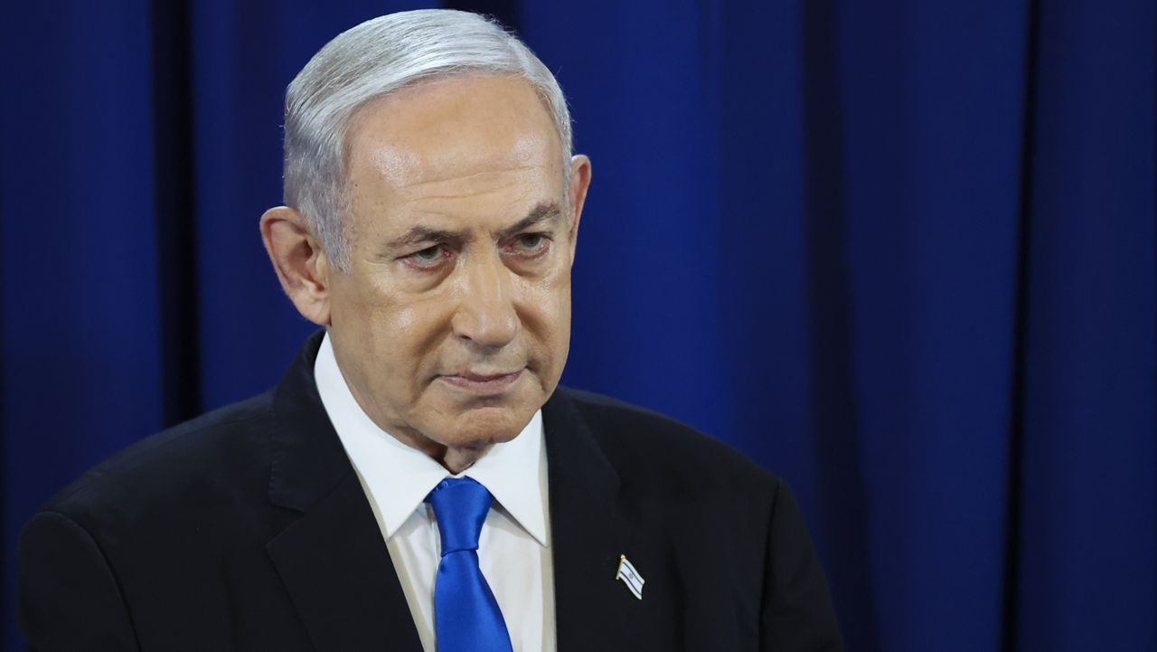 Israeli Prime Minister Benjamin Netanyahu pauses as he speaks during a press conference in Tel Aviv, Israel, Saturday, July 13, 2024. (Nir Elias/Pool Photo via AP)