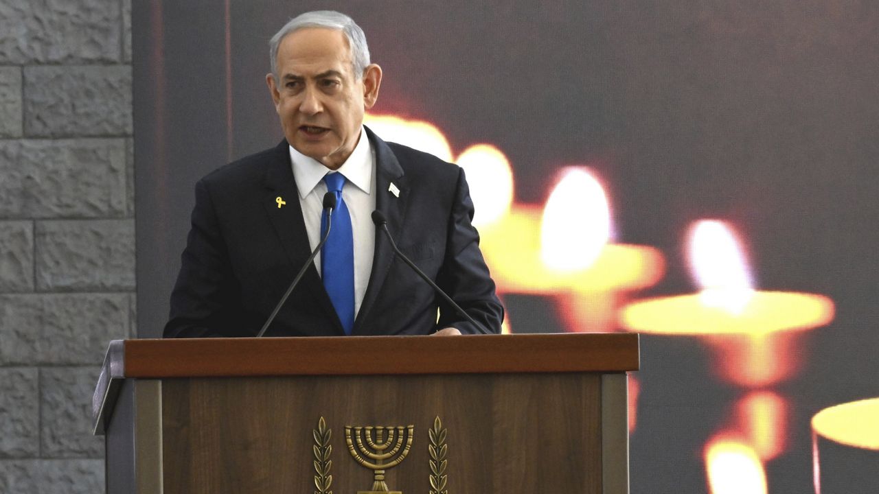 Israeli Prime Minister Benjamin Netanyahu speaks at a memorial ceremony for those killed by Hamas on Oct. 7, 2023, and those who fell in the "Iron Sword" war, at the Knesset, the Parliament, in Jerusalem, Monday, Oct. 28, 2024. (Debbie Hill, Pool Photo via AP)