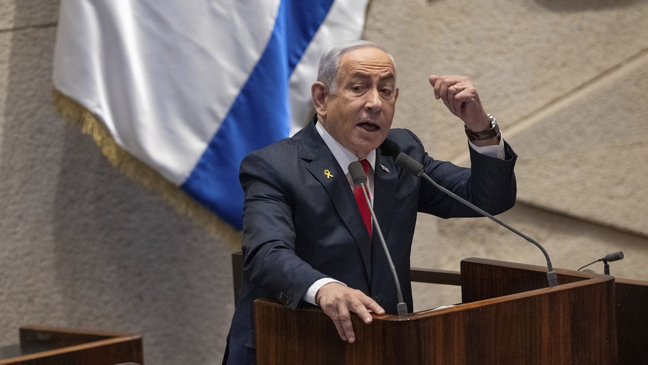 Israel's Prime Minister Benjamin Netanyahu addresses lawmakers in the Knesset, Israel's parliament, in Jerusalem. Monday Nov. 18, 2024. (AP Photo/Ohad Zwigenberg, File)