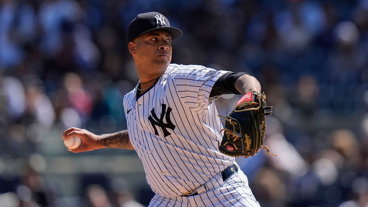 New York Yankees' Luis Gil pitches during the first inning of a baseball game against the Toronto Blue Jays Sunday, April 7, 2024, in New York. (AP Photo/Frank Franklin II)