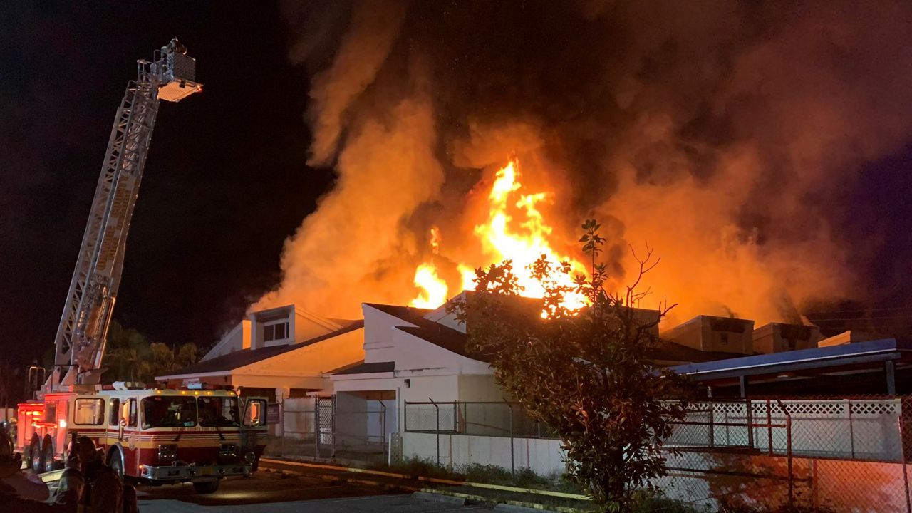 First responders, Pet Alliance and Orange County Animal Services workers rushed to save animals from the fire at the Pet Alliance facility last week until the flames were too powerful. (Orange County Animal Services)