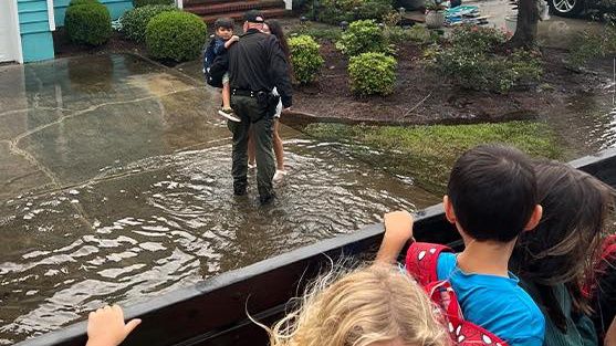 School buses at Carolina Beach Elementary School were unable to drive their usual routes, so deputies took students home in a high water vehicle. (New Hanover County Sheriff's Office via Facebook)