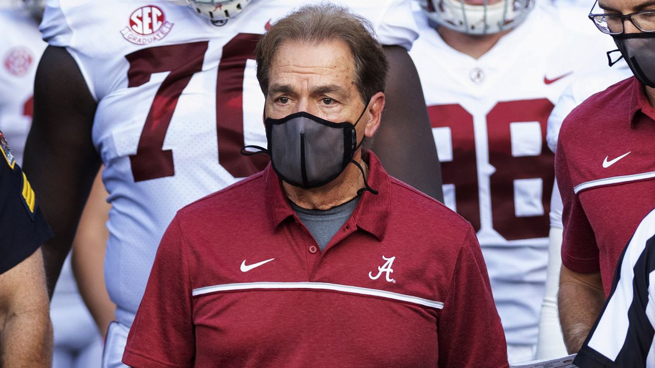 FILE - In this Sept. 26, 2020, file photo, Alabama coach Nick Saban leads his team to the field before an NCAA college football game against Missouri in Columbia, Mo. (AP Photo/L.G. Patterson, File)