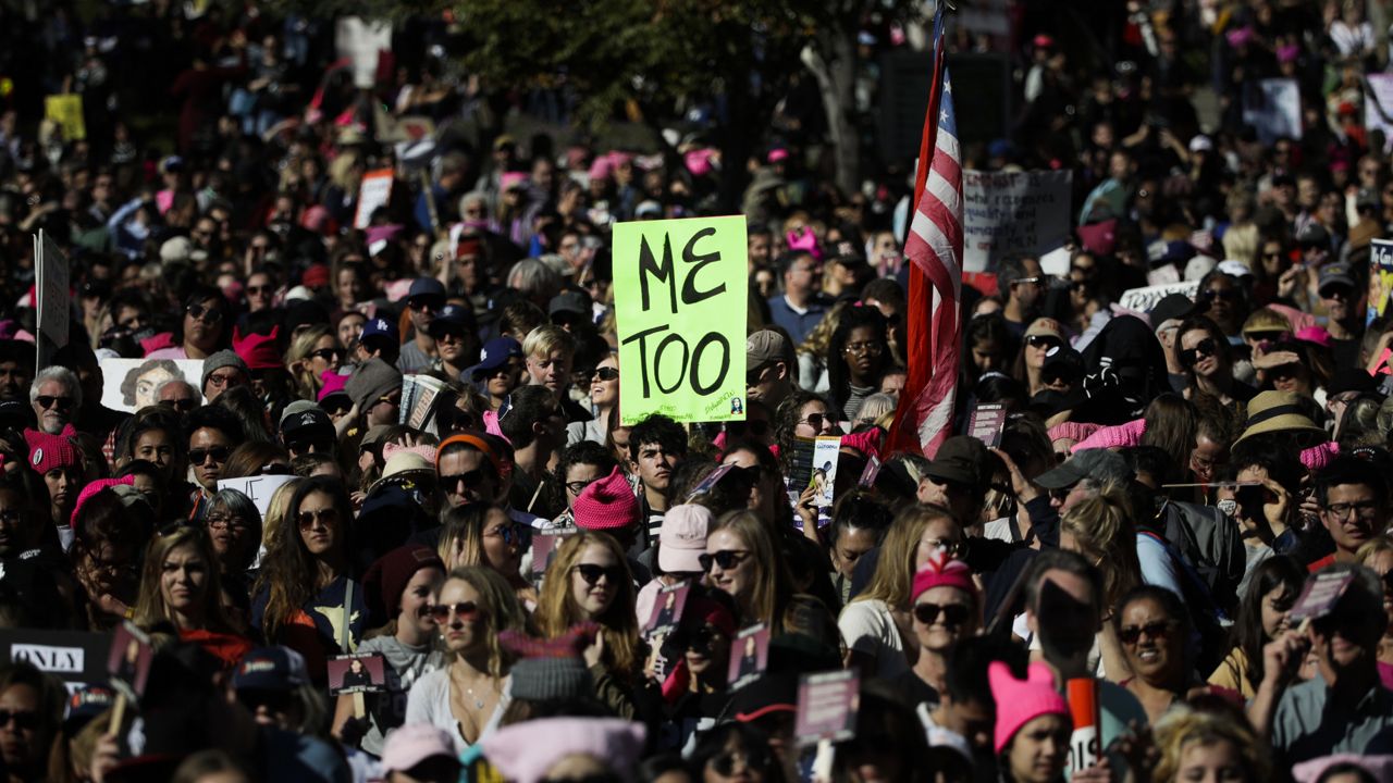 FILE - In this Jan. 20, 2018, file photo, protesters gather at the Grand Park in Los Angeles for a Women's March against sexual violence and the policies of the Trump administration. (AP Photo/Jae C. Hong, File)