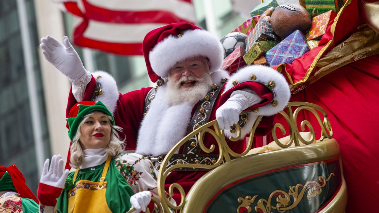 Santa Claus waves in front of Radio City Music Hall during the Macy's Thanksgiving Day Parade, Thursday, Nov. 28, 2019, in New York. (AP Photo/Eduardo Munoz Alvarez)