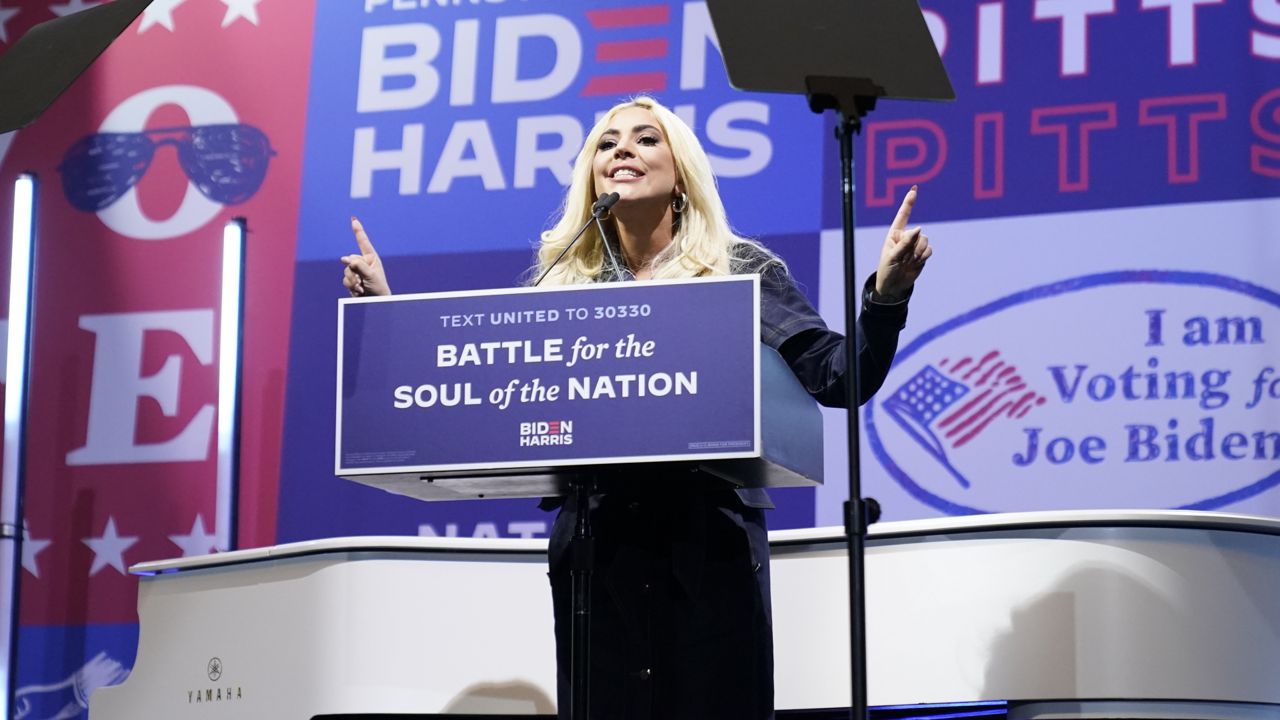 FILE: Lady Gaga speaks before performing during a drive-in rally for Democratic presidential candidate former Vice President Joe Biden at Heinz Field, Monday, Nov. 2, 2020, in Pittsburgh. (AP Photo/Andrew Harnik)