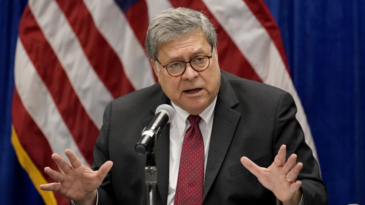 FILE: U.S. Attorney General William Barr speaks during a roundtable discussion on Operation Legend, a federal program to help cities combat violent crime, Thursday, Oct. 15, 2020, in St. Louis. (AP Photo/Jeff Roberson)