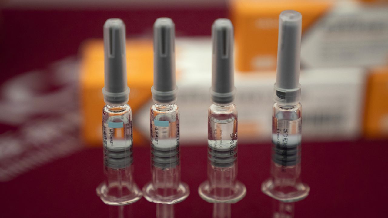 FILE: In this Sept. 24, 2020, file photo, syringes of SARS CoV-2 Vaccine for COVID-19 produced by Sinovac are displayed during a media tour of its factory in Beijing. (AP Photo/Ng Han Guan, File)