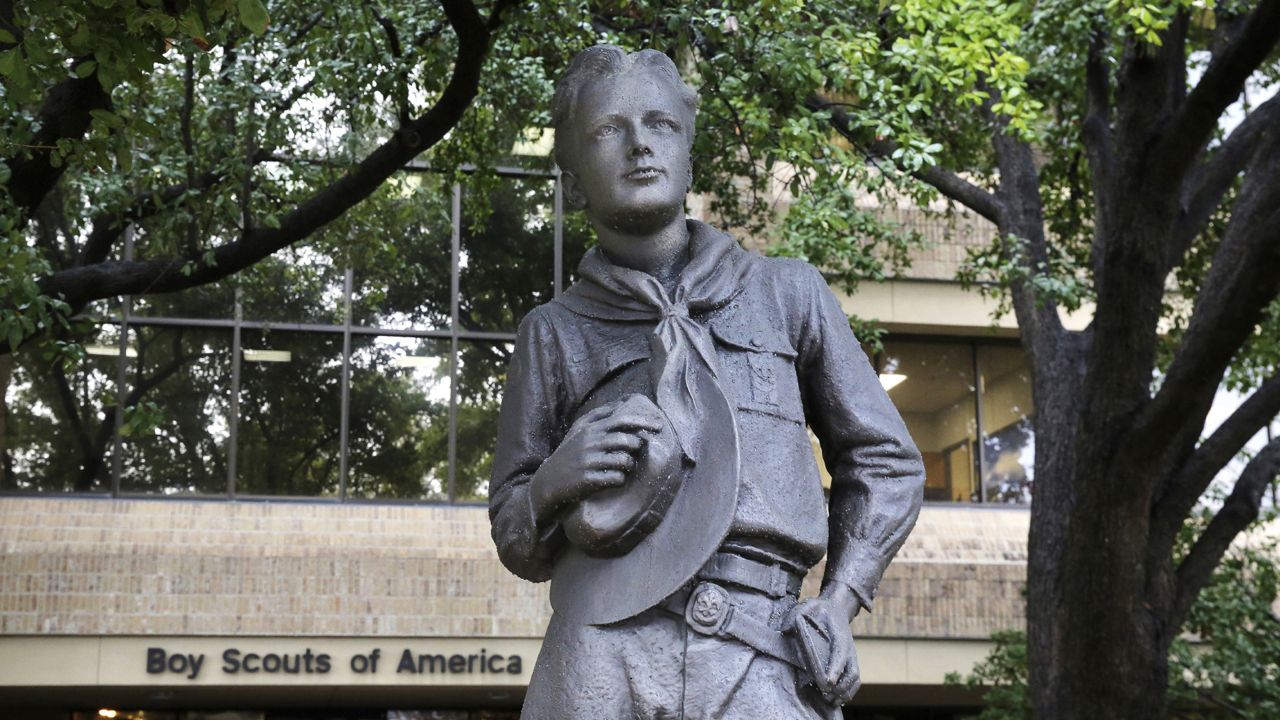 FILE - In this Feb. 12, 2020 file photo, a statue stands outside the Boys Scouts of America headquarters in Irving, Texas. (AP Photo/LM Otero, File)