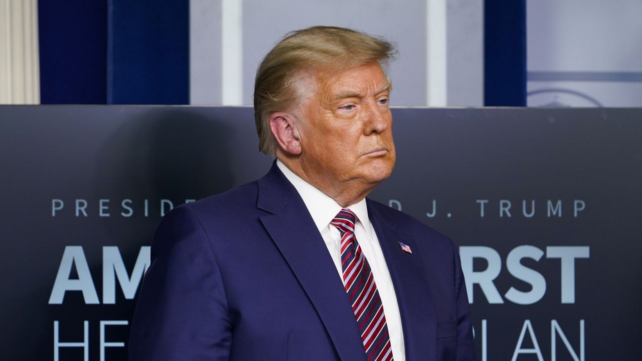 FILE - In this Nov. 20, 2020, file photo President Donald Trump listens during a news conference in the briefing room at the White House in Washington. (AP Photo/Susan Walsh, File)