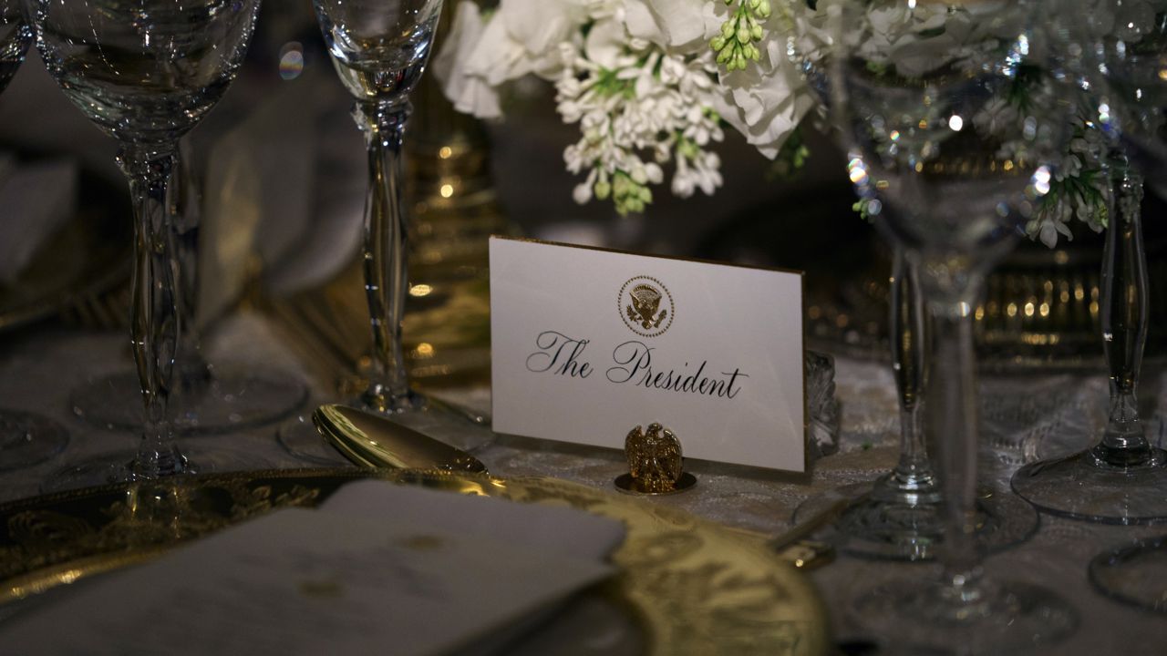 FILE: A replica from a previous President Donald Trump administration State Dinner is seen in the China Room during the 2018 Christmas preview at the White House in Washington, Monday, Nov. 26, 2018. A name card for President Donald Trump is shown. (AP Photo/Carolyn Kaster)