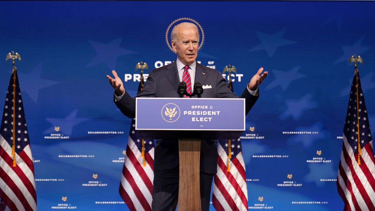 President-elect Joe Biden speaks about jobs at The Queen theater, Friday, Dec. 4, 2020, in Wilmington, Del. (AP Photo/Andrew Harnik)