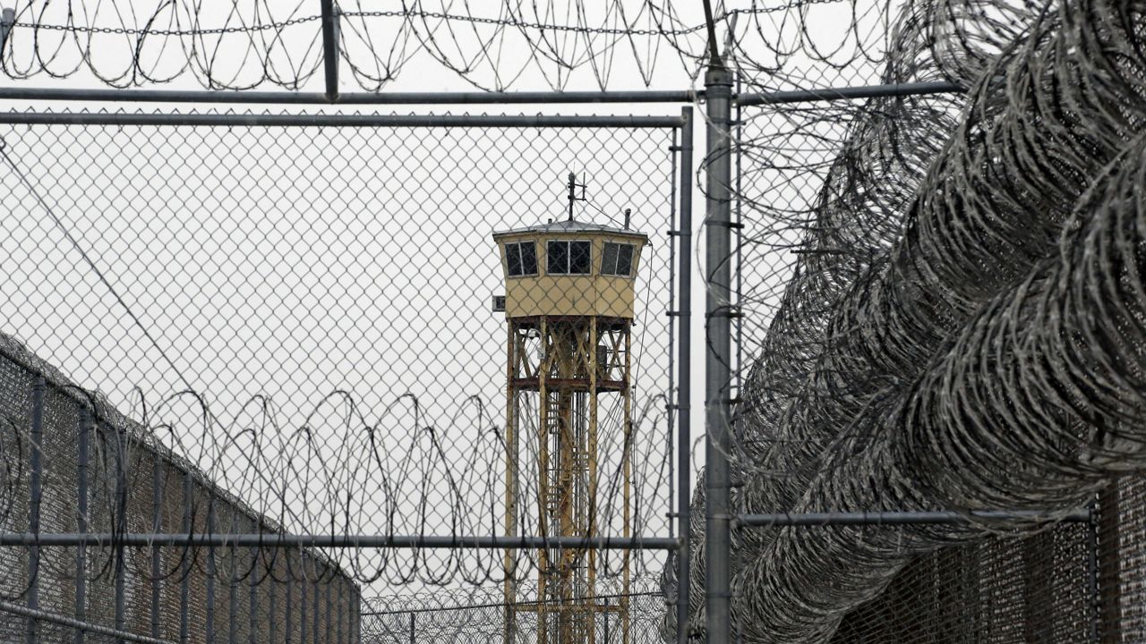 FILE - In this Feb. 25, 2015, file photo, a watch tower at the Utah State Correctional Facility in Draper, Utah. (AP Photo/Rick Bowmer, Pool, File)