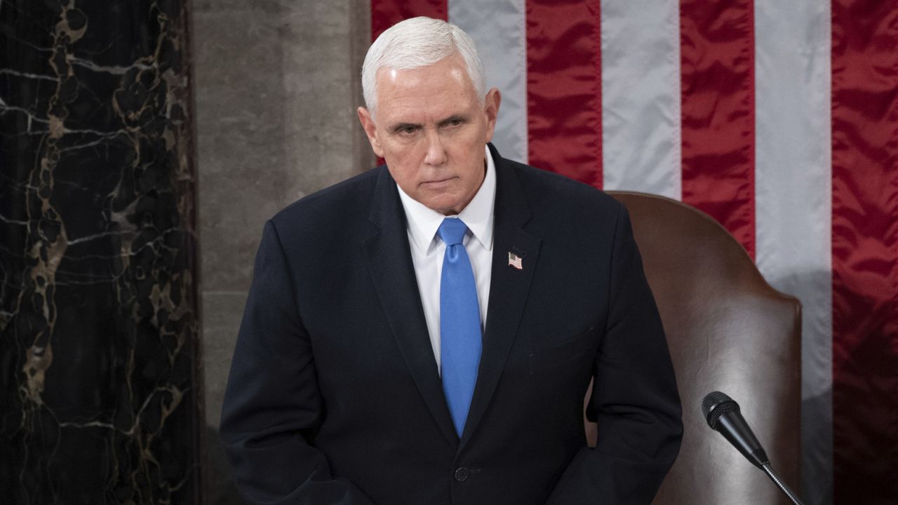 Vice President Mike Pence presides over a joint session of Congress as it convenes to count the Electoral College votes cast in November's election, at the Capitol in Washington, Wednesday, Jan. 6, 2021. (Saul Loeb/Pool via AP)