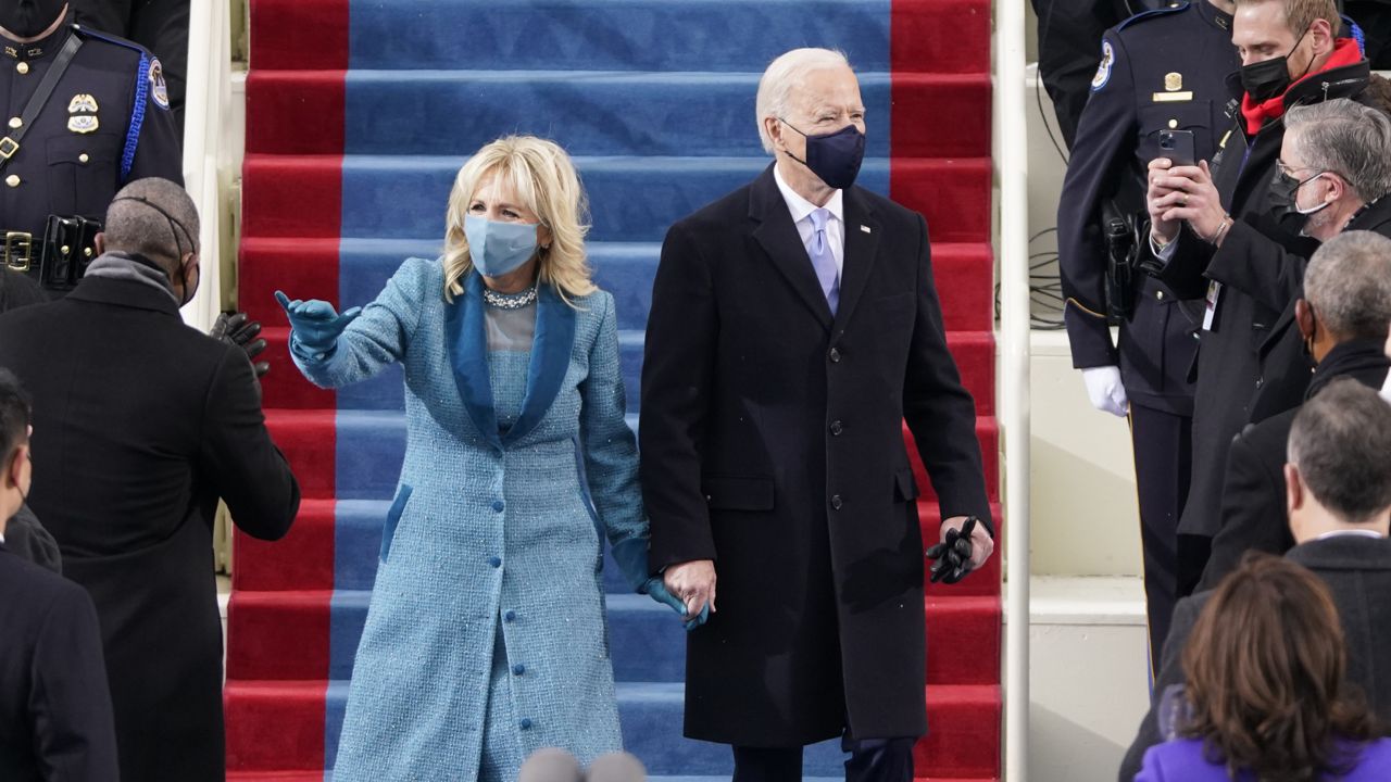 President-elect Joe Biden and his wife Jill, walk out for the 59th Presidential Inauguration at the U.S. Capitol in Washington, Wednesday, Jan. 20, 2021. (AP Photo/Patrick Semansky, Pool)