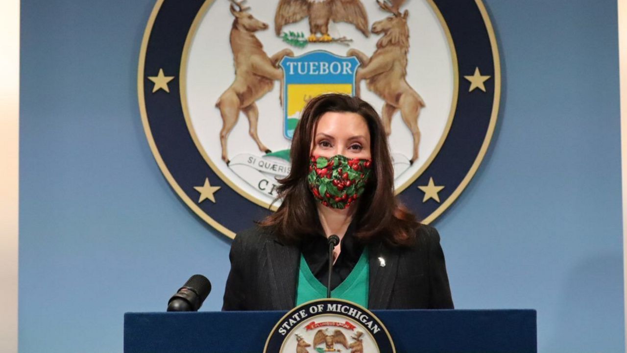 FILE: In this photo provided by the Michigan Office of the Governor, Gov. Gretchen Whitmer addresses the state, Friday, Jan. 22, 2021, in Lansing, Mich. (Michigan Office of the Governor via AP)