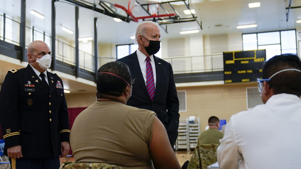 President Joe Biden tours the COVID-19 vaccine center at Walter Reed National Military Medical Center Friday, Jan. 29, 2021, in Bethesda, Md. (AP Photo/Alex Brandon)