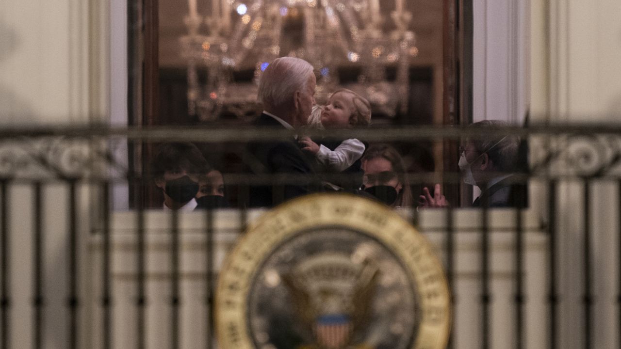 President Joe Biden holds his grandson Beau Biden at the White House, Wednesday, Jan. 20, 2021, in Washington. (AP Photo/Evan Vucci)