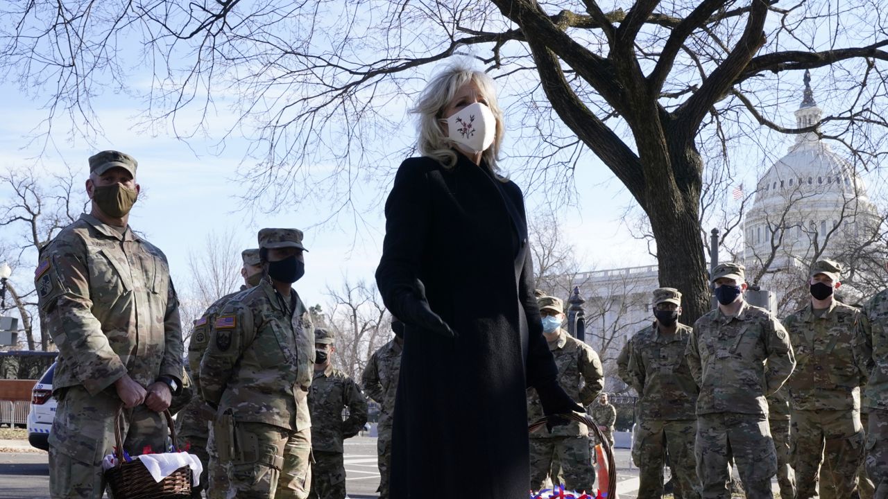 FILE: First lady Jill Biden surprises National Guard members outside the Capitol with chocolate chip cookies, Friday, Jan. 22, 2021, in Washington. (AP Photo/Jacquelyn Martin, Pool)