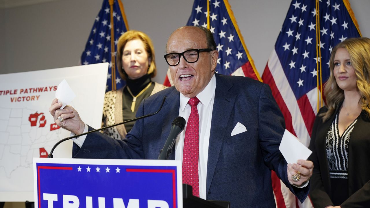 FILE - In this Nov. 19, 2020, file photo, former Mayor of New York Rudy Giuliani, a lawyer for President Donald Trump, speaks during a news conference. (AP Photo/Jacquelyn Martin, File)