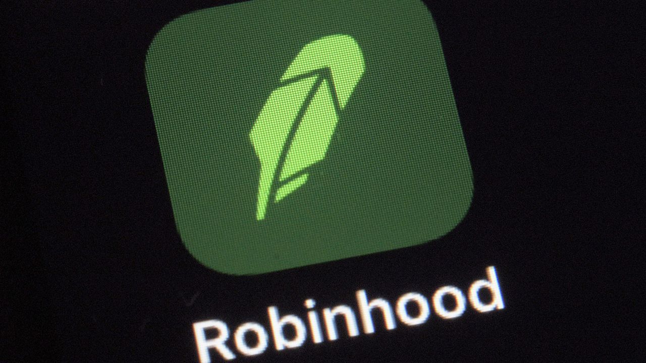 FILE - This Dec. 17, 2020 file photo shows the logo for the Robinhood app on a smartphone in New York. (AP Photo/Patrick Sison, File)