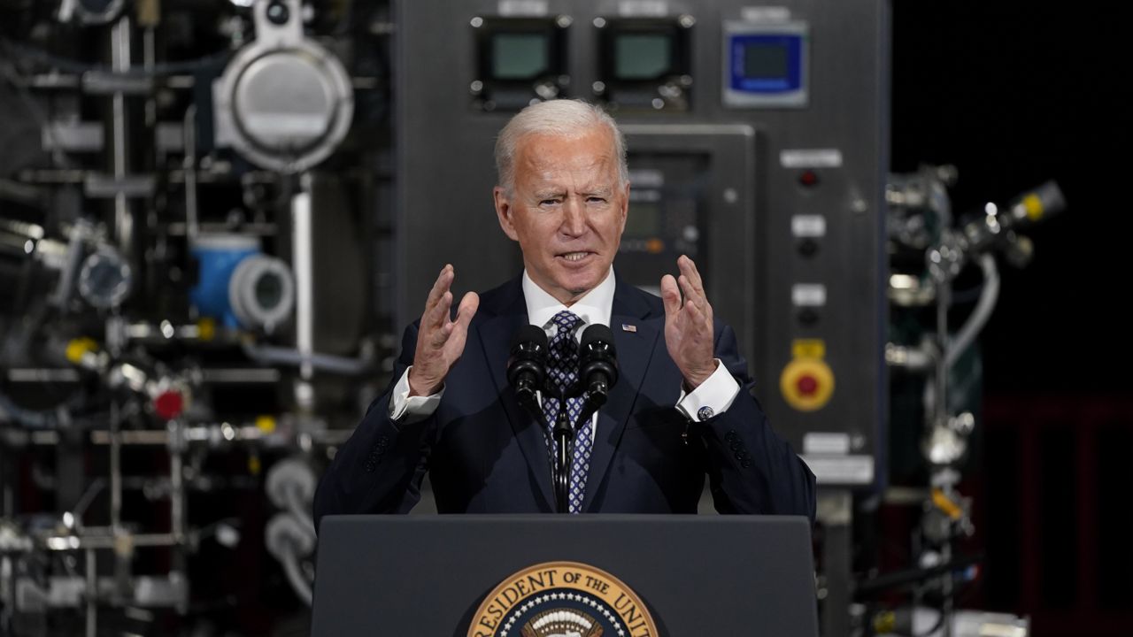 President Joe Biden speaks after a tour of a Pfizer manufacturing site, Friday, Feb. 19, 2021, in Portage, Mich. (AP Photo/Evan Vucci)