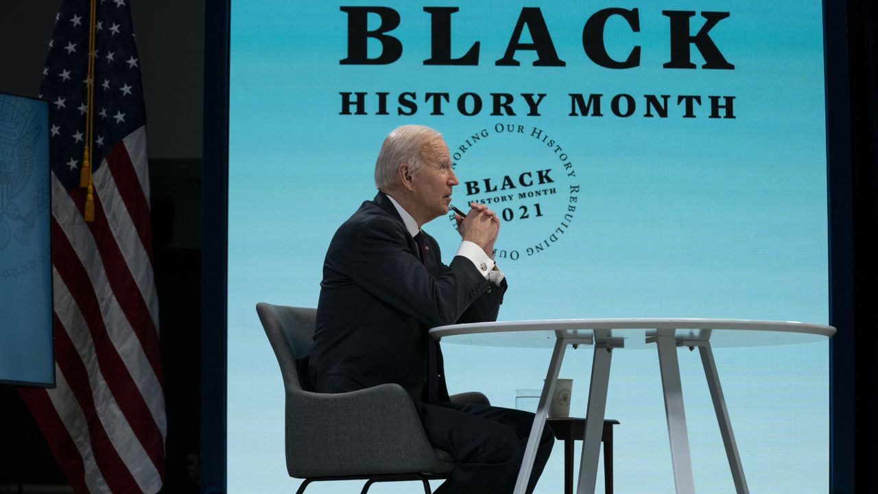 President Joe Biden speaks during a virtual roundtable with Black essential workers  Tuesday, Feb. 23, 2021, in Washington. (AP Photo/Evan Vucci)