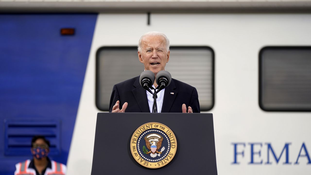 President Joe Biden speaks at a FEMA COVID-19 mass vaccination site at NRG Stadium, Friday, Feb. 26, 2021, in Houston. (AP Photo/Patrick Semansky)