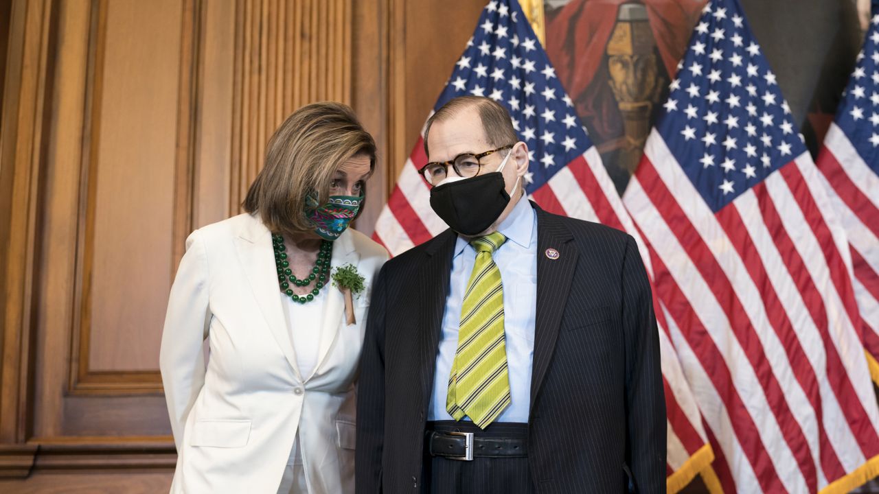 Speaker of the House Nancy Pelosi, D-Calif., left, confers with Rep. Jerrold Nadler, D-N.Y., the House Judiciary Committee chairman, at a news conference on reauthorizing the Violence Against Women Reauthorization Act, at the Capitol in Washington, Wednesday, March 17, 2021. (AP Photo/J. Scott Applewhite)