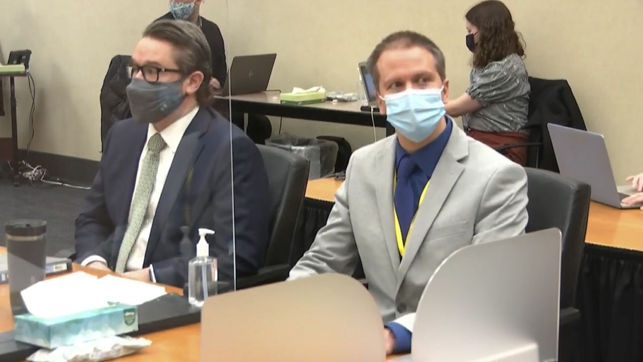 In this image from video, defense attorney Eric Nelson, left, and defendant, former Minneapolis police officer Derek Chauvin.  (Court TV via AP, Pool)
