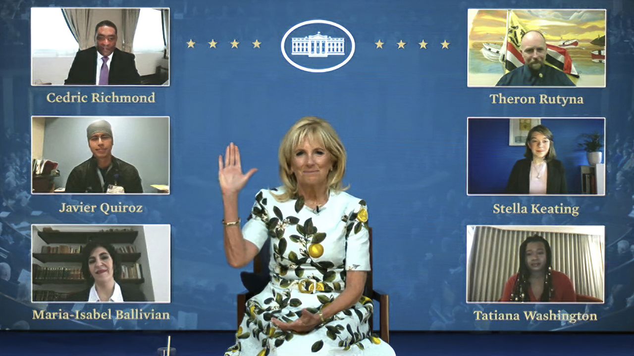 In this image from video provided by The White House, first lady Jill Biden waves to her virtual guests on Wednesday, April 28, 2021. (White House via AP)