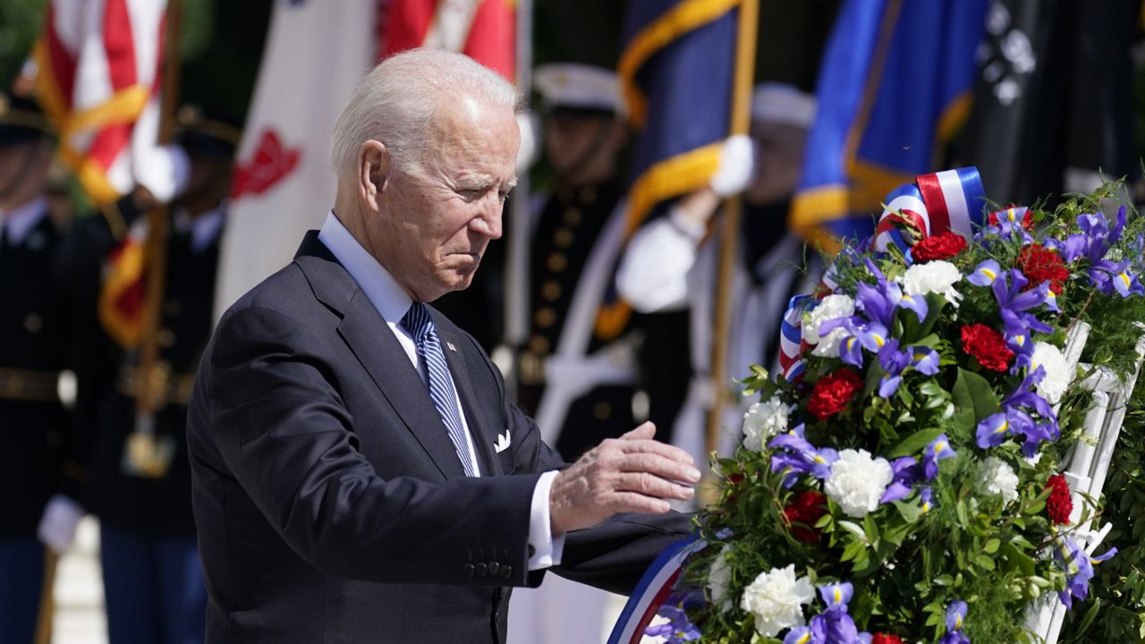 President Joe Biden places a wreath at the Tomb of the Unknown Soldier at Arlington National Cemetery on Memorial Day, Monday, May 31, 2021, in Arlington, Va.(AP Photo/Alex Brandon)