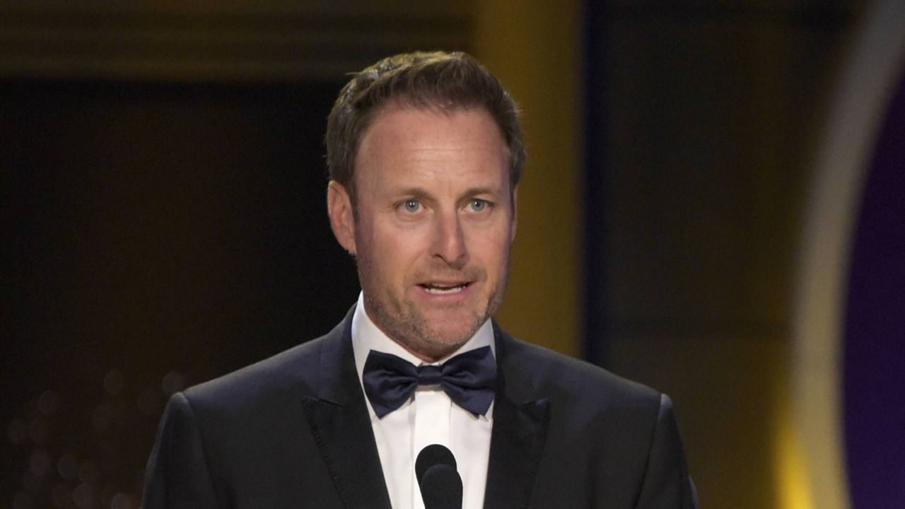 FILE: Chris Harrison presents the award for outstanding entertainment talk show host at the Daytime Emmy Awards on April 29, 2018. (Photo by Richard Shotwell/Invision/AP, File)