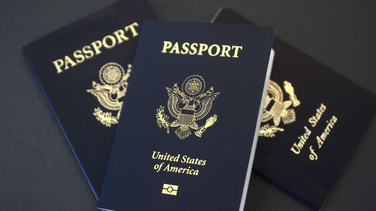 This May 25, 2021 photo shows a U.S. Passport cover in Washington. (AP Photo/Eileen Putman)