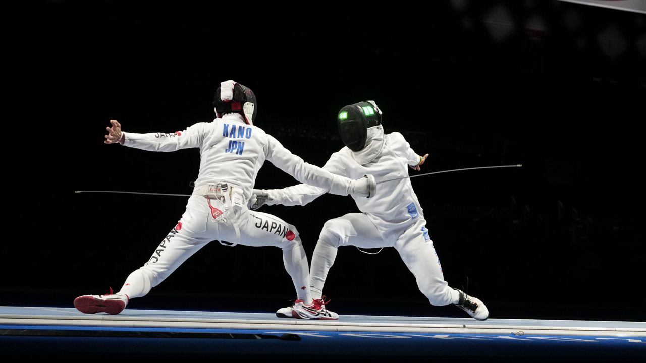 FILE: Yeisser Ramirez of the United States in the men's Epee team round of 16 at the 2020 Summer Olympics, Friday, July 30, 2021, in Chiba, Japan. Ramirez is a teammate of Alen Hadzic, who has been accused of misconduct. (AP Photo/Andrew Medichini)