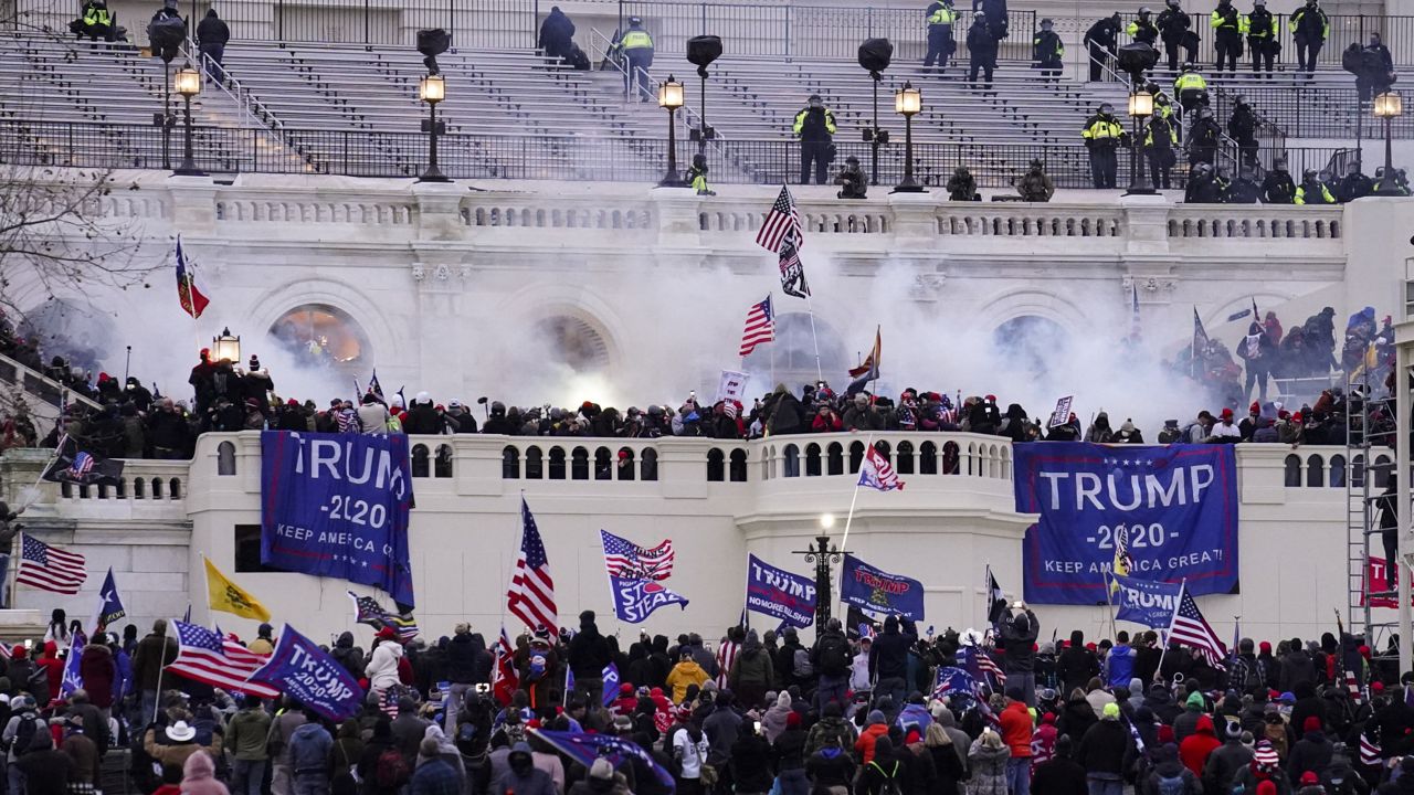 FILE - Violent protesters, loyal to then-President Donald Trump, storm the Capitol, Wednesday, Jan. 6, 2021, in Washington. (AP Photo/John Minchillo, File)