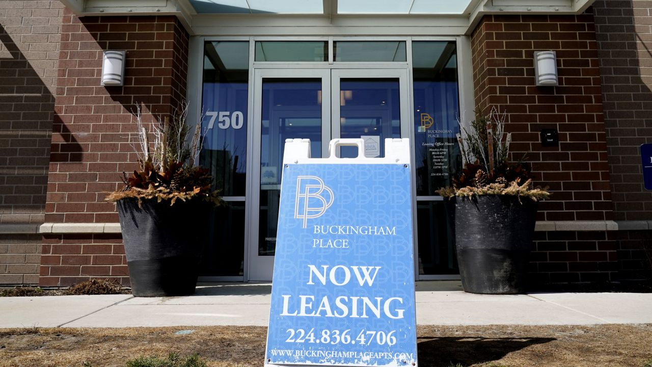 FILE: This March 21, 2021 photo shows a leasing sign is displayed outside of residential building in Des Plaines, Ill. (AP Photo/Nam Y. Huh)