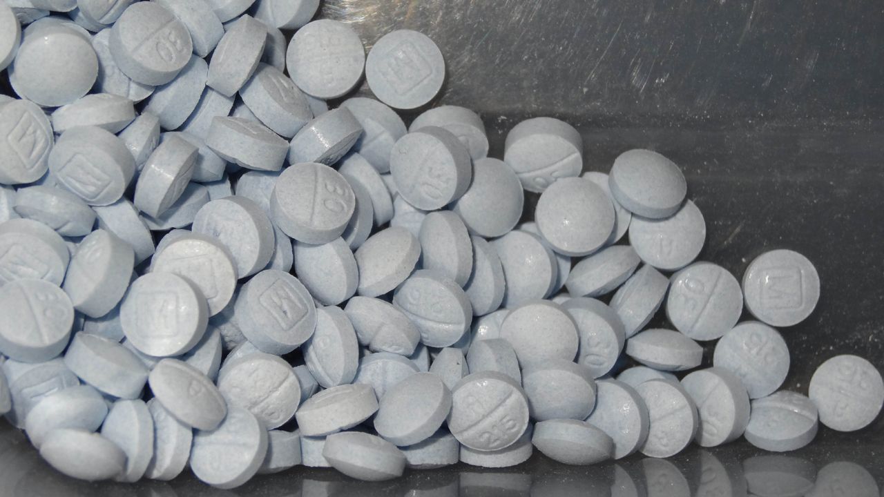 FILE - This undated file photo provided by the U.S. Attorneys Office for Utah shows fentanyl-laced fake oxycodone pills collected during an investigation. (U.S. Attorneys Office for Utah via AP, File)