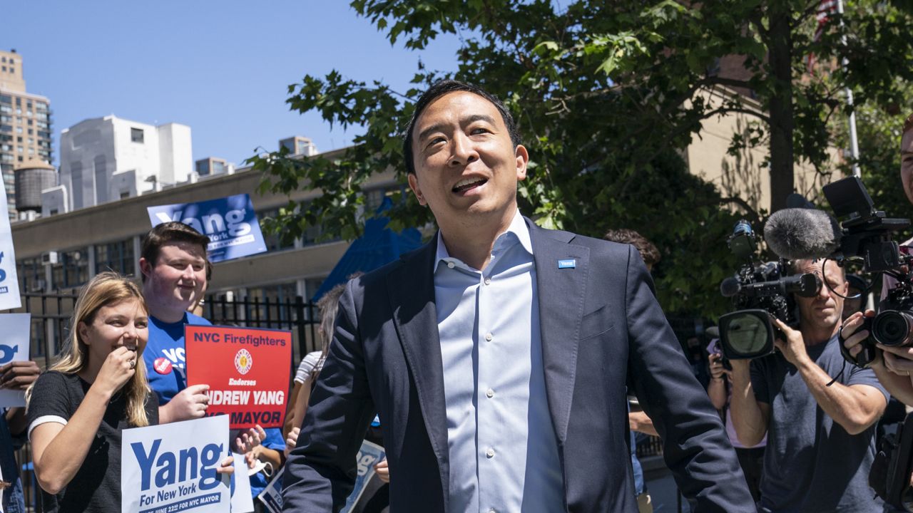 FILE: Then-New York City mayoral candidate Andrew Yang arrives to an early voting site before casting his vote, Wednesday, June 16, 2021, in New York. (AP Photo/John Minchillo)