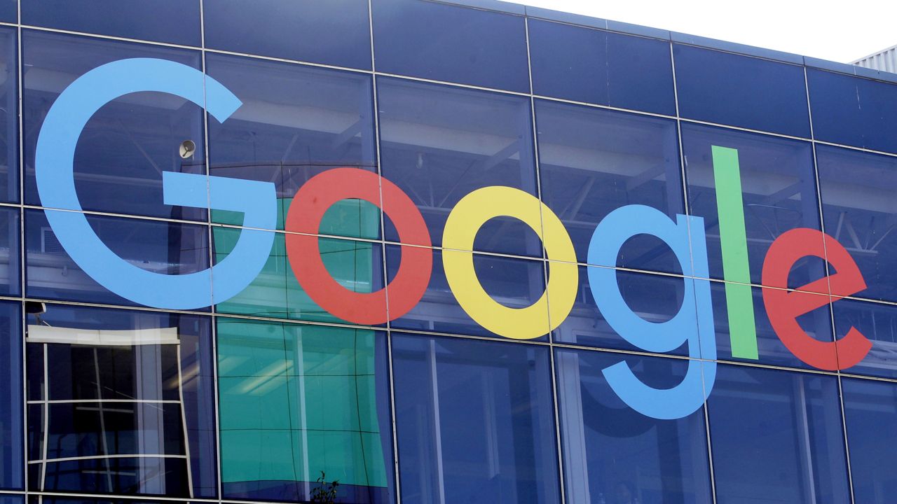 FILE - In this Sept. 24, 2019, file photo a sign is shown on a Google building at their campus in Mountain View, Calif. (AP Photo/Jeff Chiu, File)