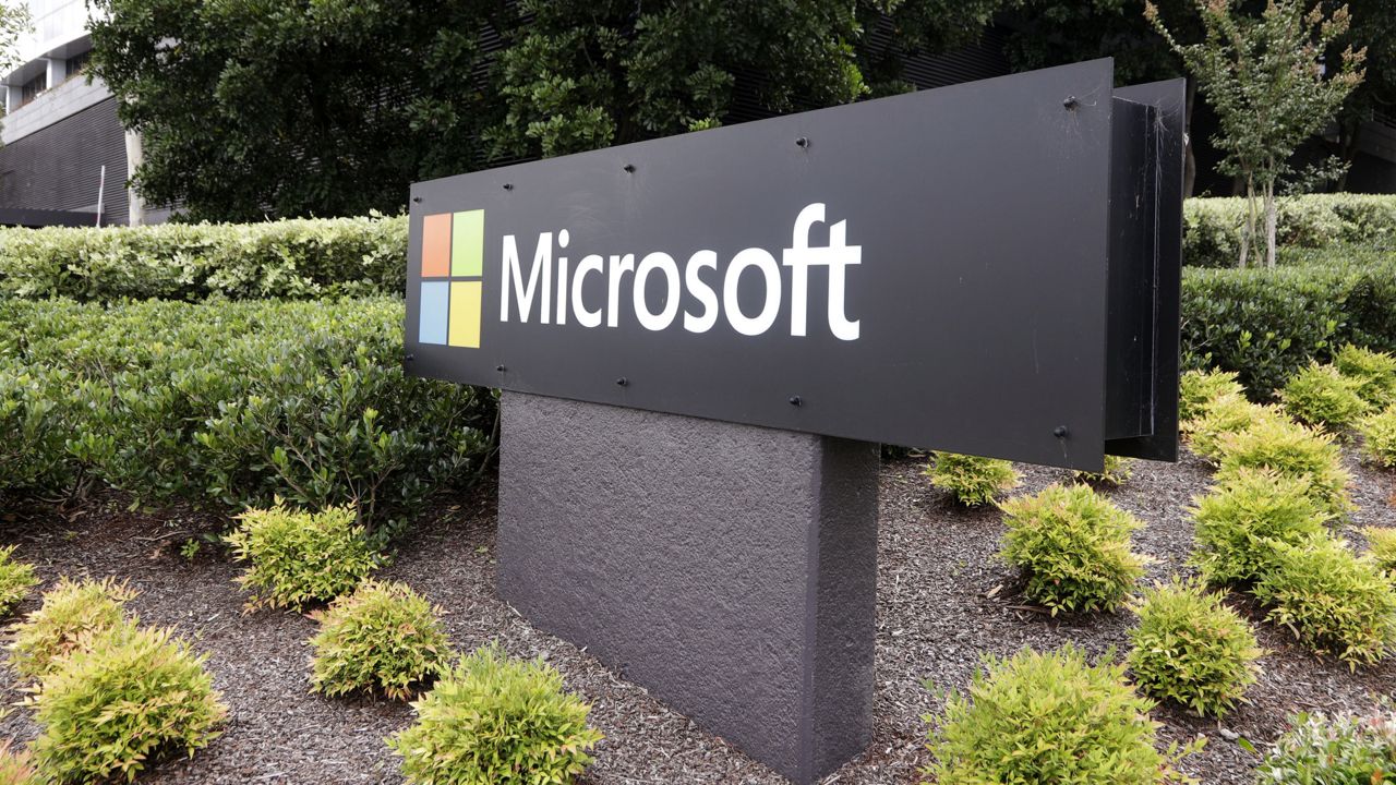 FILE: The Microsoft company logo is displayed at their offices in Sydney, Wednesday, Feb. 3, 2021. (AP Photo/Rick Rycroft)