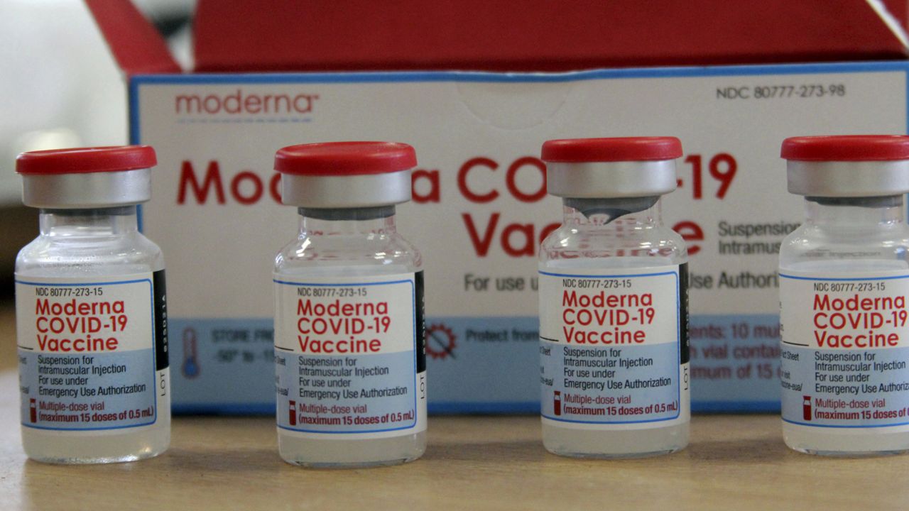 FILE - In this Sunday, Aug. 15, 2021 file photo, vials of the Moderna COVID-19 vaccine are seen at a school. (AP Photo/Hassene Dridi, file)