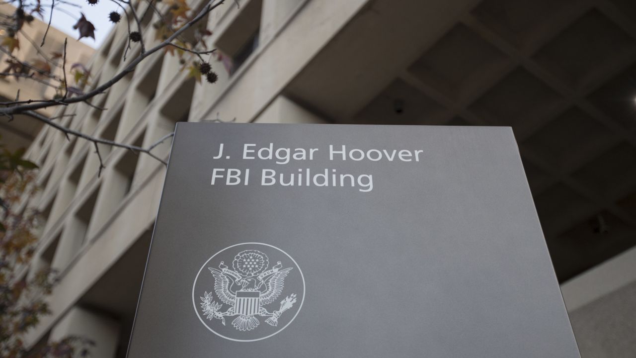 FILE - In this Nov. 30, 2017, file photo, the J. Edgar Hoover FBI building in Washington. (AP Photo/Carolyn Kaster, File)