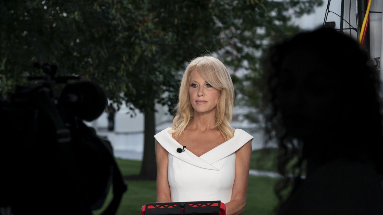 FILE: Counselor to the President Kellyanne Conway prepares to do a television interview at the White House, Wednesday, Aug. 26, 2020, in Washington. (AP Photo/Alex Brandon)